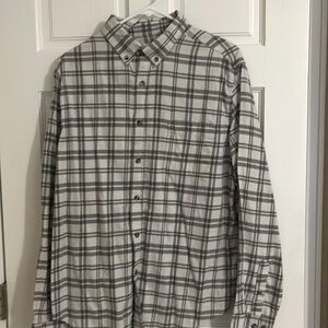 Four Goodfellow men’s flannel shirts. 1 L, 2 XL and 1 XXL